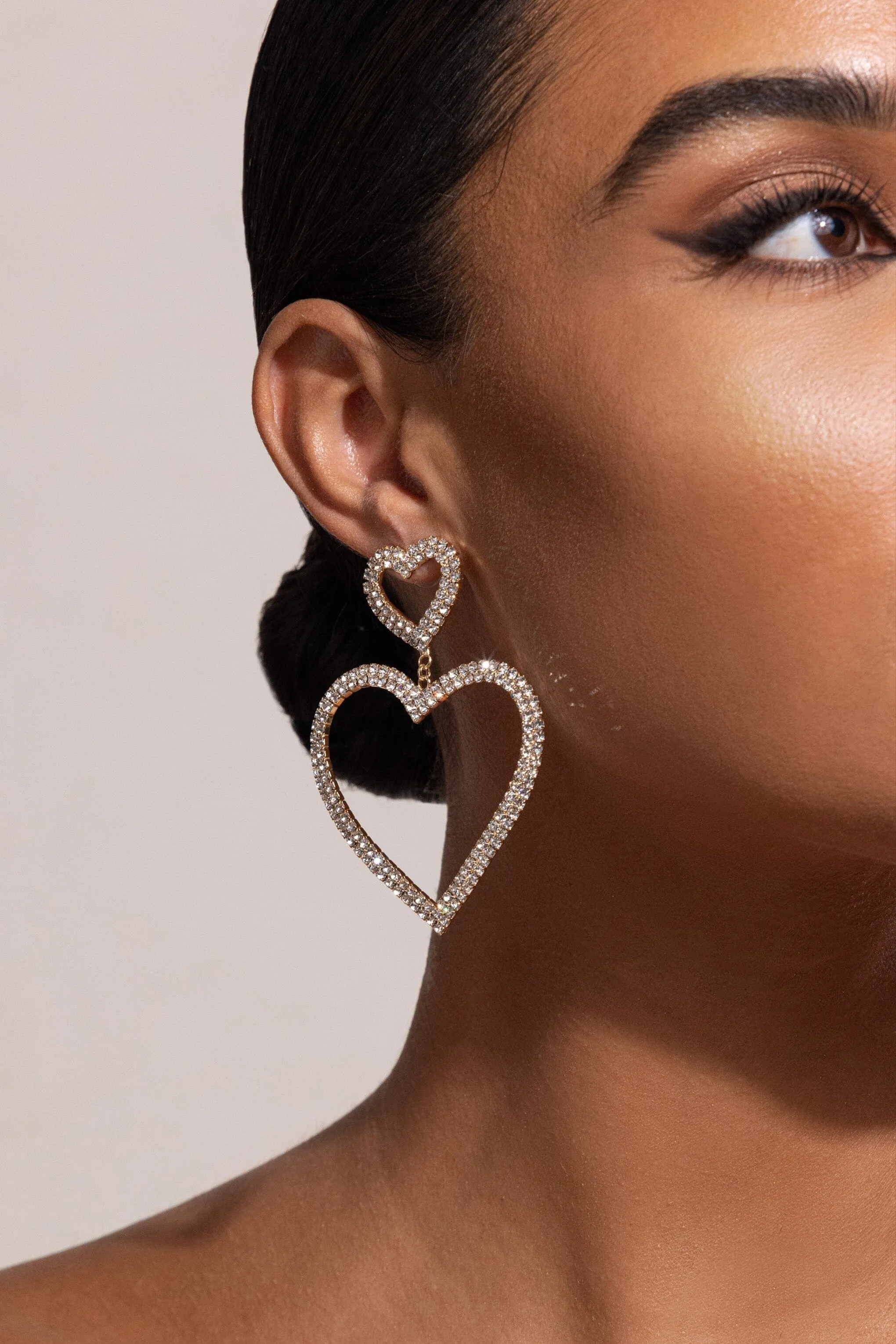 GOLD DIAMANTE HEART SHAPE DROP EARRINGS Gloria Lanvin