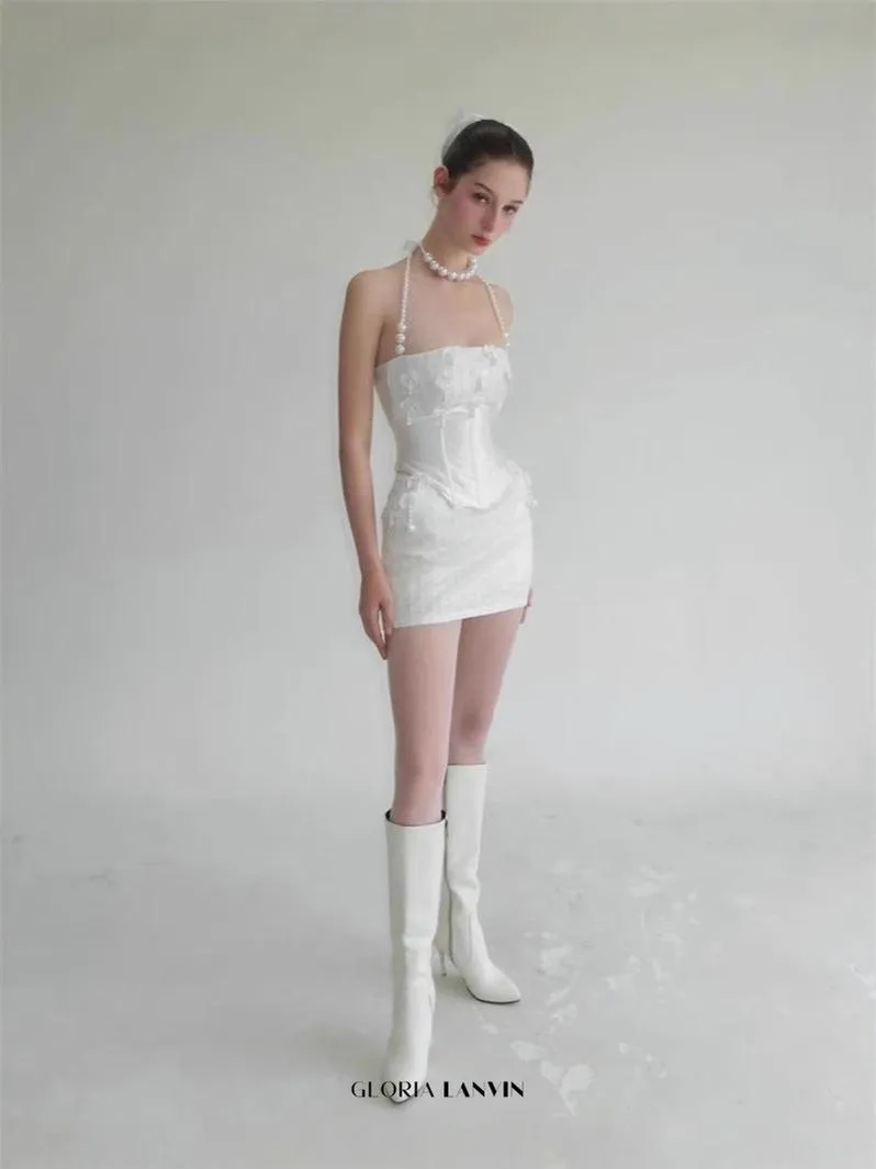 pearl fishbone wrap top skirt set in white Gloria Lanvin
